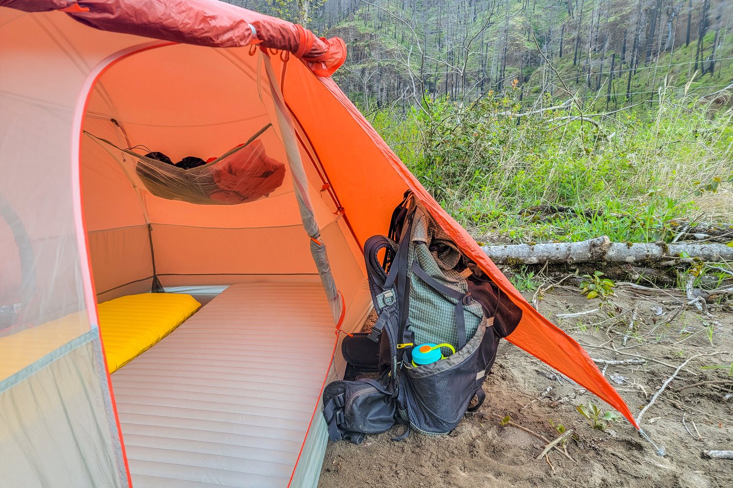 A backpack filling up most of the space in the Copper Spur's medium-size vestibule