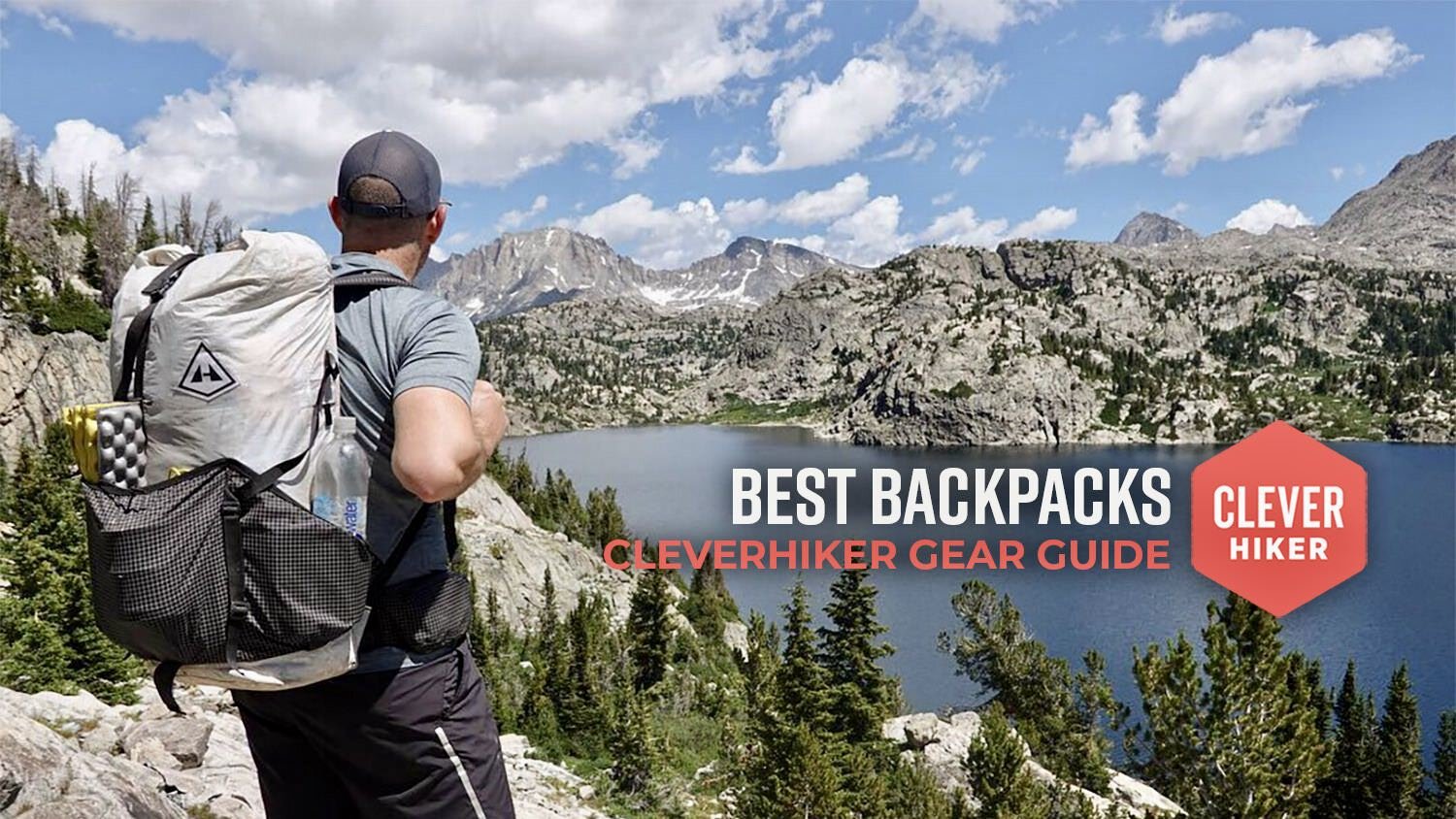 best backpacks title shot hiker standing looking out over a lake in the mountains