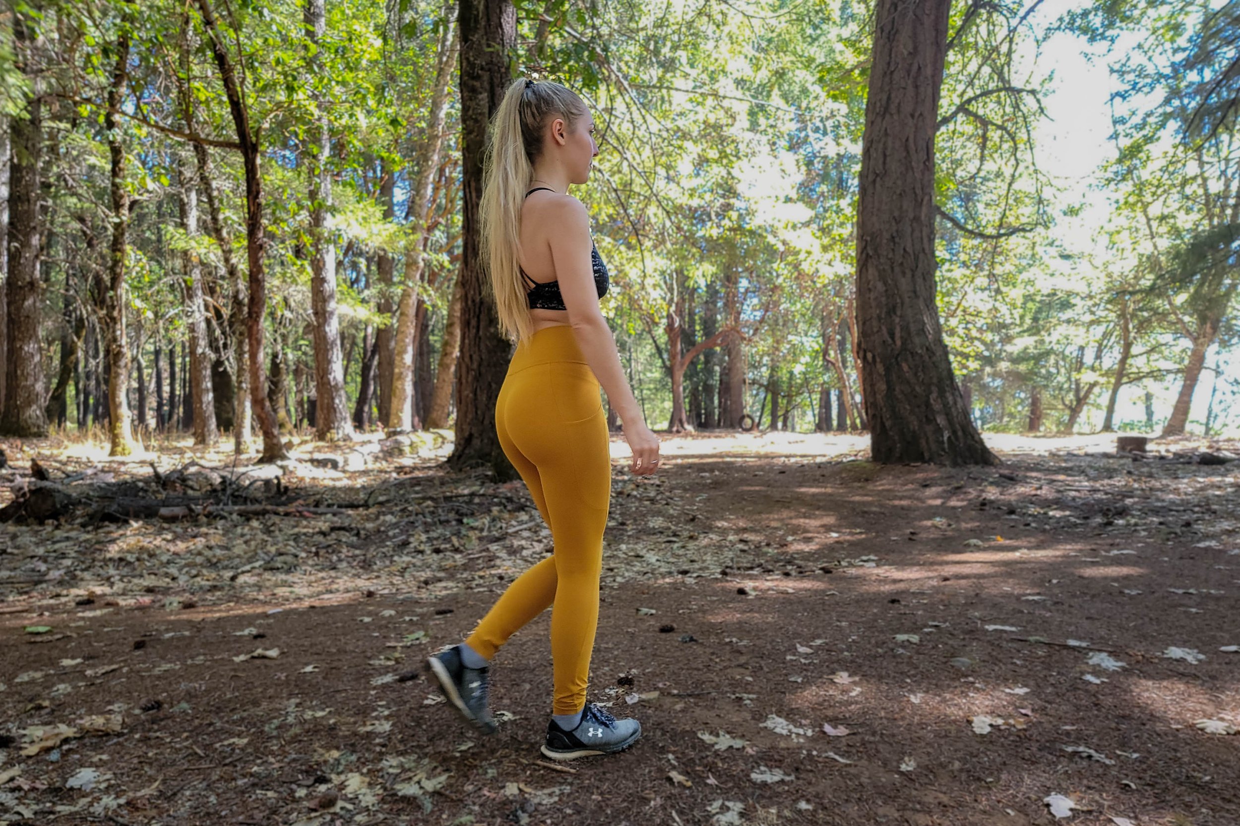 A trail runner wearing the REI Take Your Time Leggings