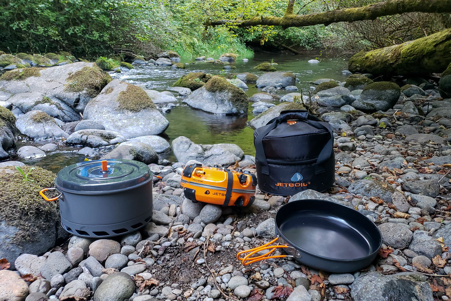 The Jetboil Genesis Basecamp System features large-volume cookware &amp; a super compact stove that nests inside