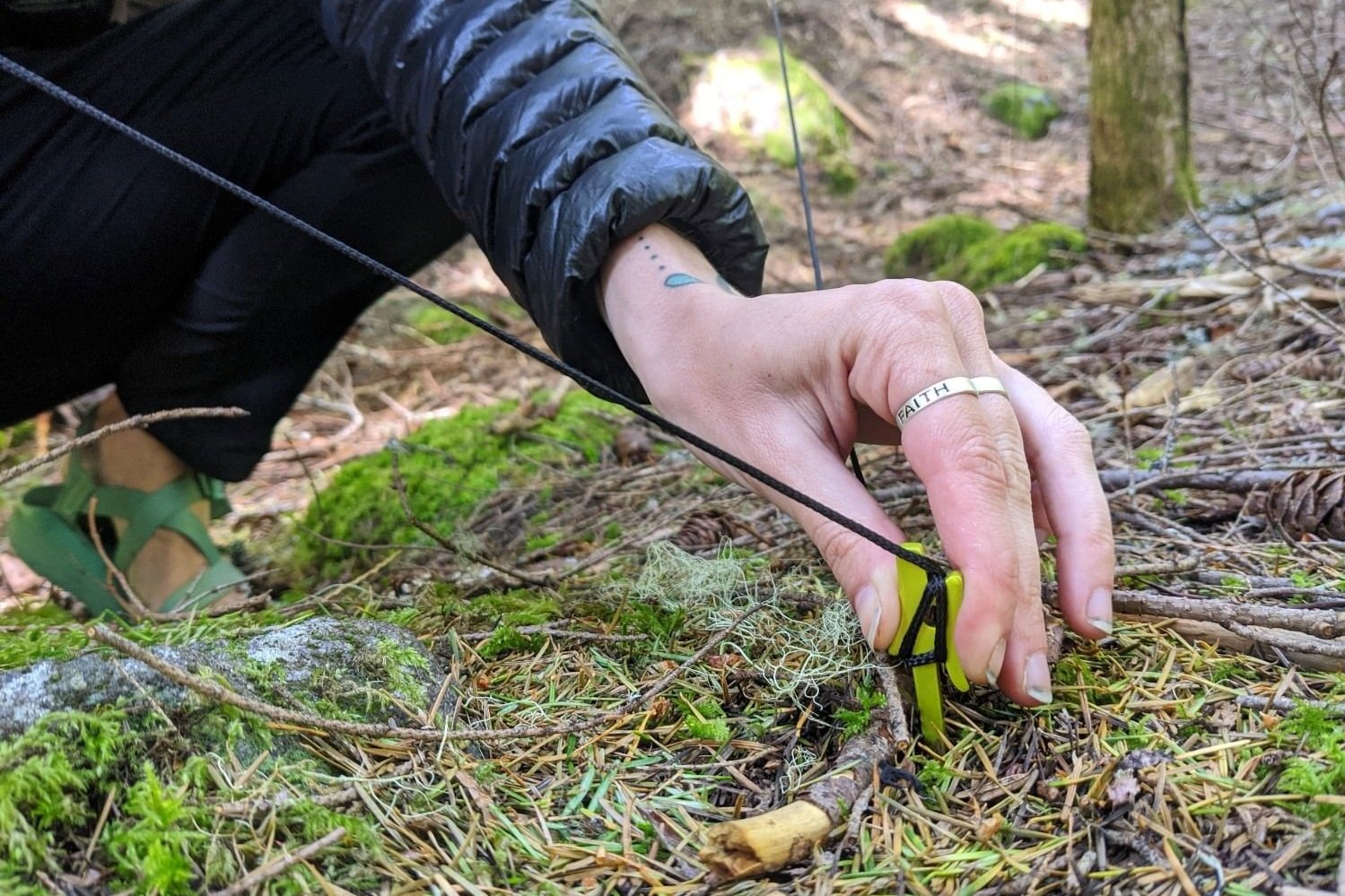 A NEMOAirpin stake with a guyline wrapped around the cleat head