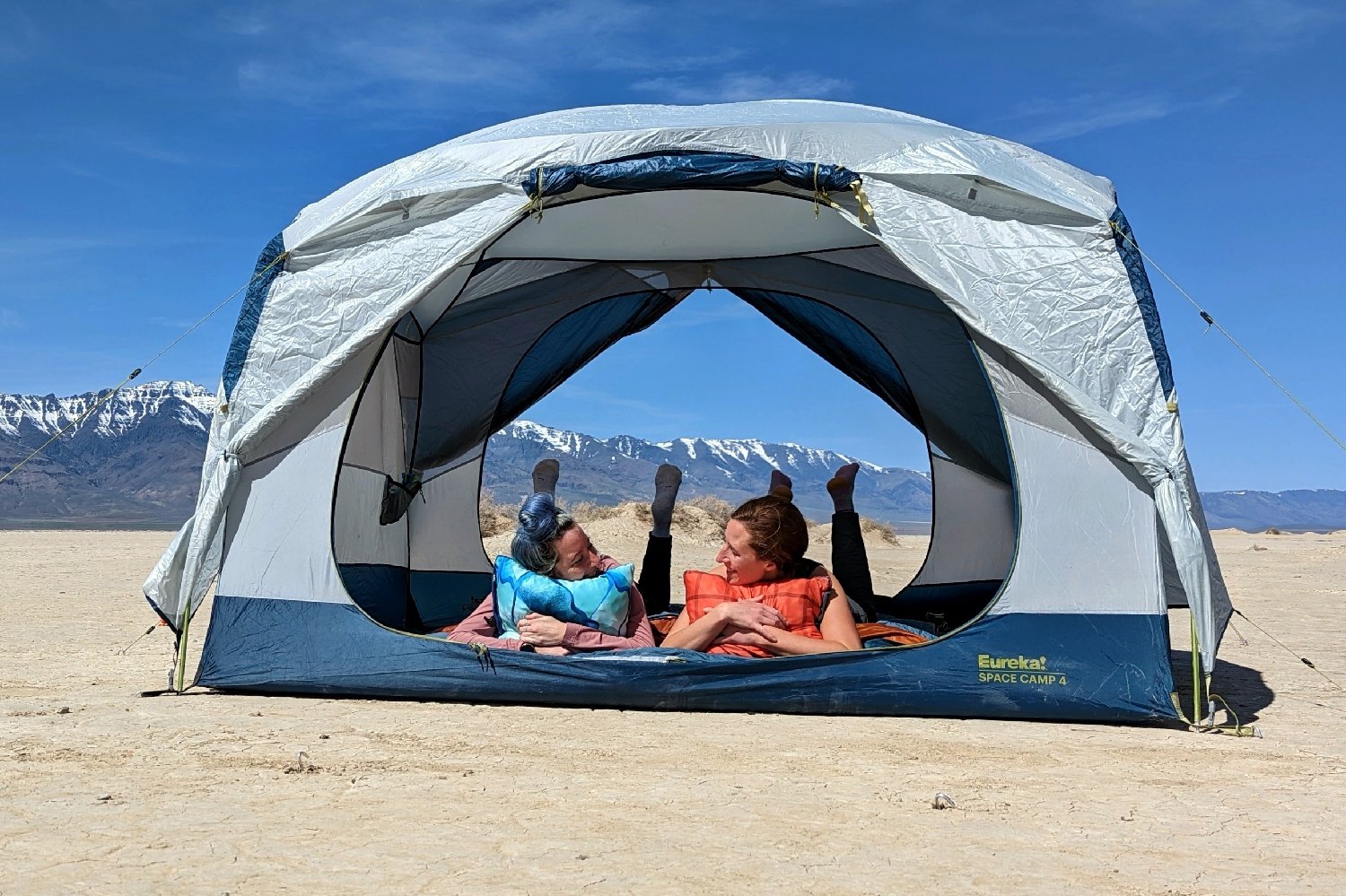 Two friends hanging out in the Eureka Space Camp 4 in the desert