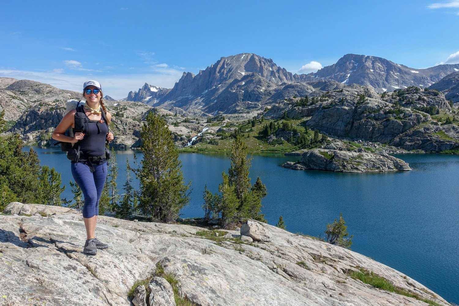 A backpacker wearing an older version of the Patagonia Pack Out Crops in the Wind River Range