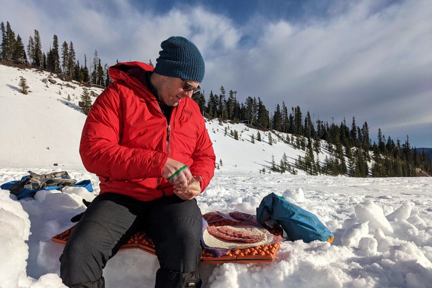 Foam sleeping pads like the Gossamer Gear Thinlight or NEMO Switchback are convenient and lightweight trail chairs.