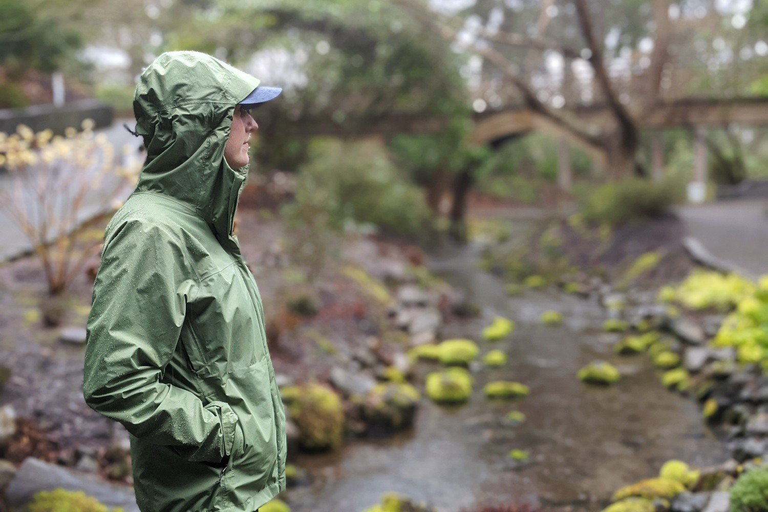 A day hiker wearing the Patagonia Torrentshell rain jacket